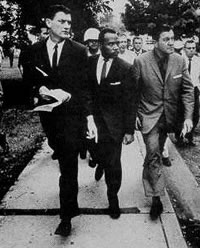 James Meredith escorted